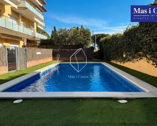 Swimming pool of Planta baja for sale in L'Escala  with Air Conditioner, Heating and Private garden