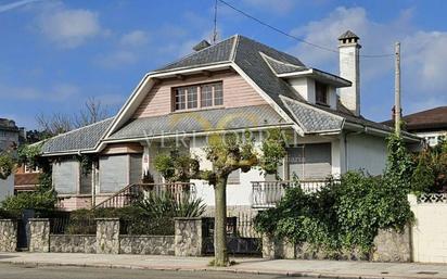 Vista exterior de Casa o xalet en venda en Castrillón amb Calefacció, Jardí privat i Terrassa