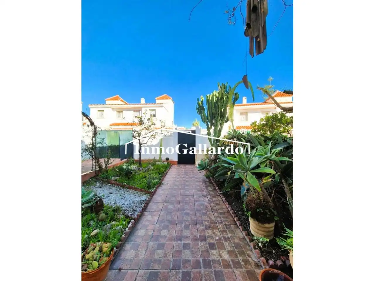 Jardí de Casa adosada en venda en Vélez-Málaga amb Jardí privat i Piscina comunitària
