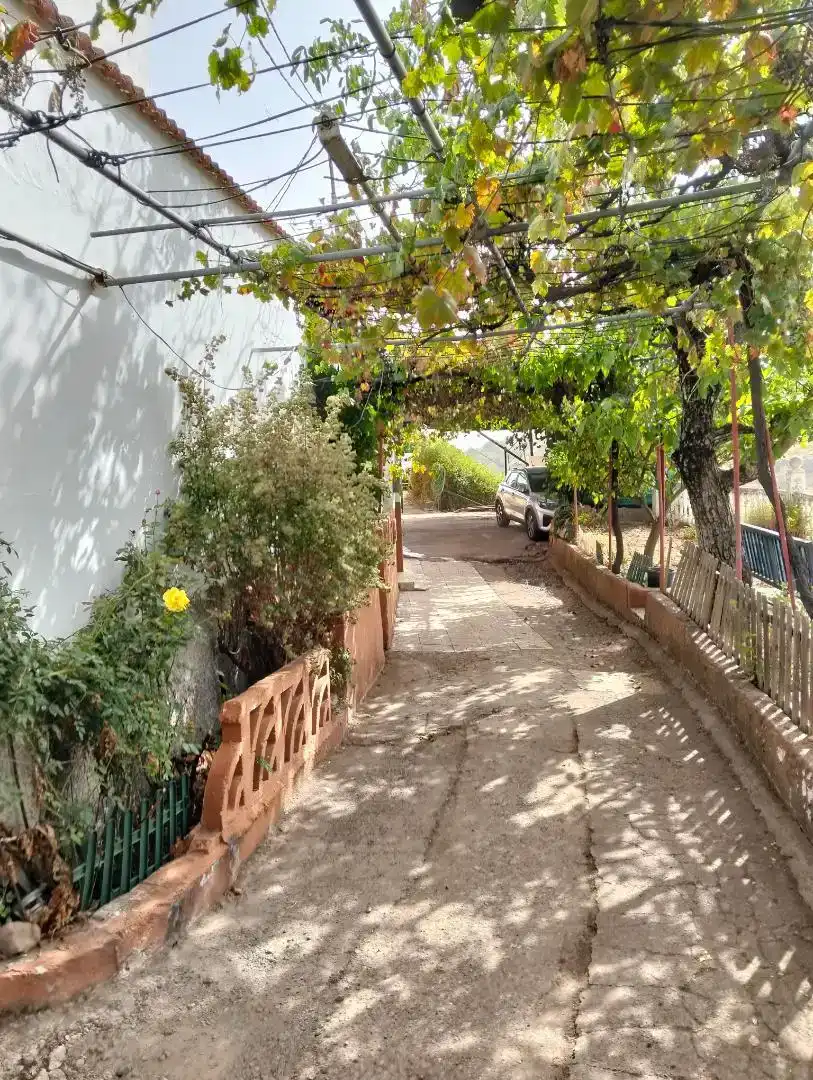Vista exterior de Casa adosada en venda en Vega de San Mateo amb Jardí privat, Piscina i Microones