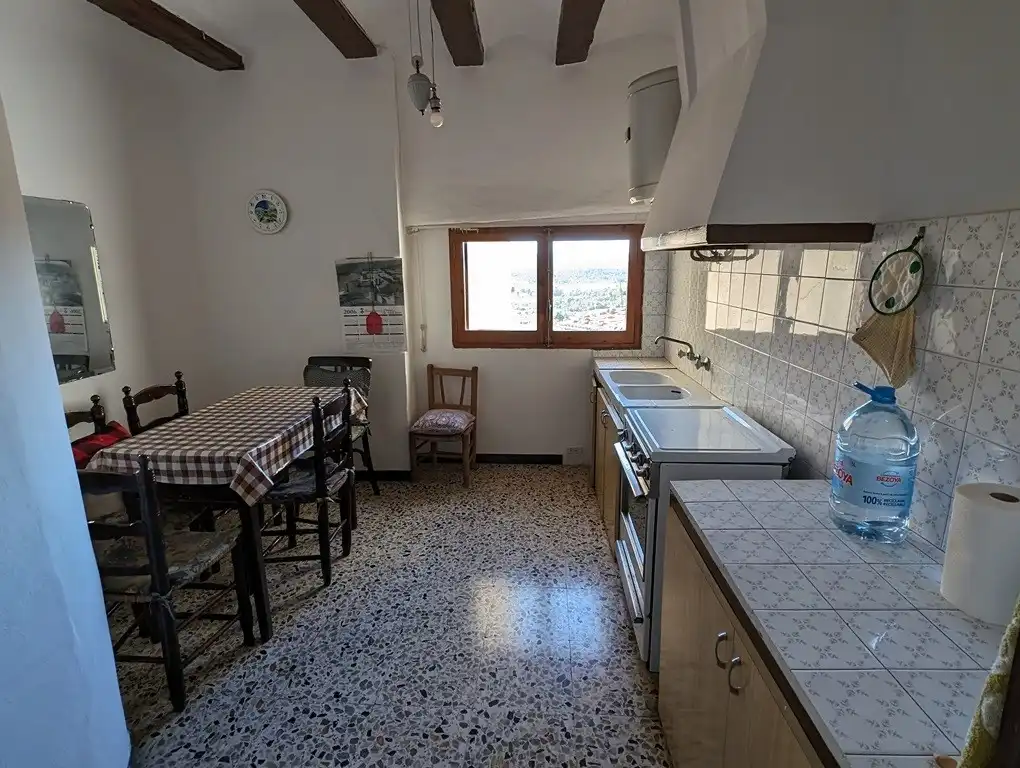 Cuina de Casa o xalet en venda en Horta de Sant Joan amb Jardí privat, Terrassa i Moblat
