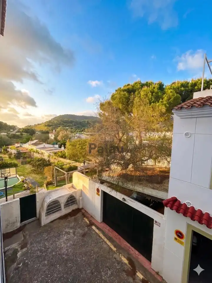 Außenansicht von Wohnung zum Verkauf in Ferreries mit Klimaanlage, Terrasse und Gemeinschaftspool