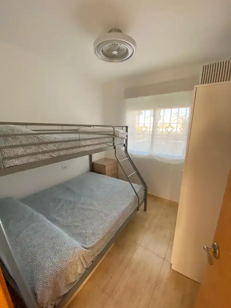 Dormitori de Pis de lloguer en Peñíscola / Peníscola amb Aire condicionat, Jardí privat i Piscina