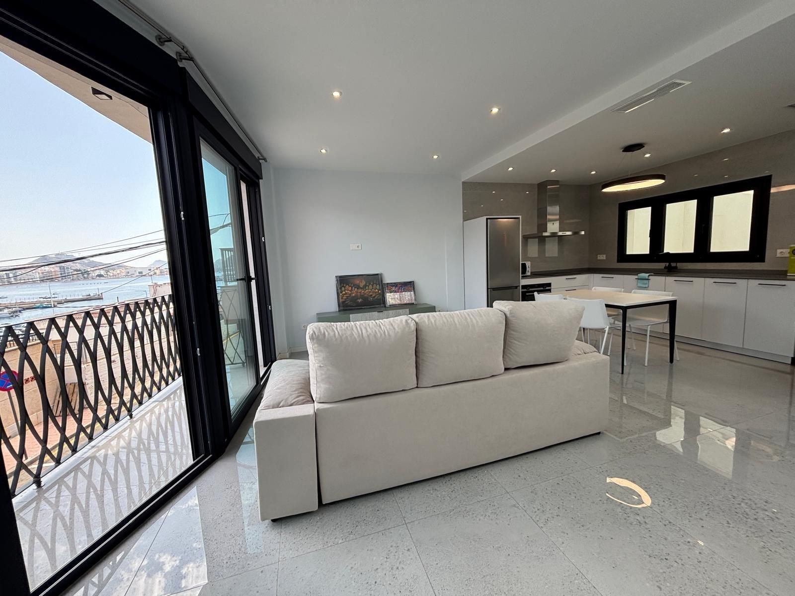 Sala d'estar de Casa adosada de lloguer en Águilas amb Aire condicionat i Moblat