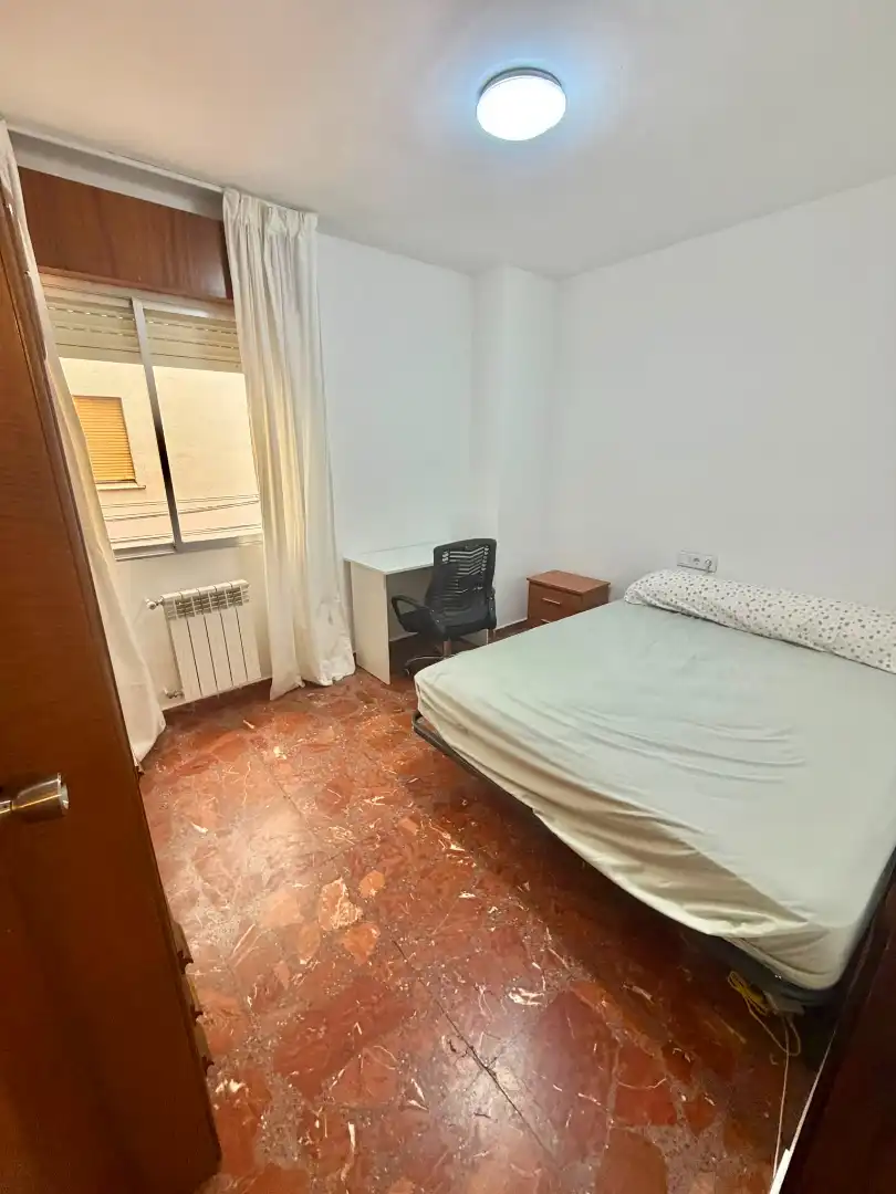 Bedroom of Flat for share in Jaén  with Air Conditioner, Heating and Furnished
