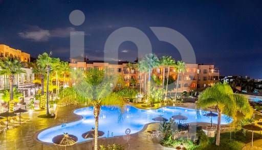Swimming pool of Flat for sale in Estepona
