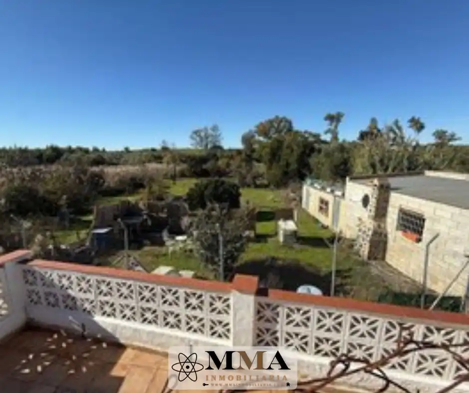 Jardín de Finca rústica en venta en Gibraleón con Aire acondicionado, Terraza y Piscina