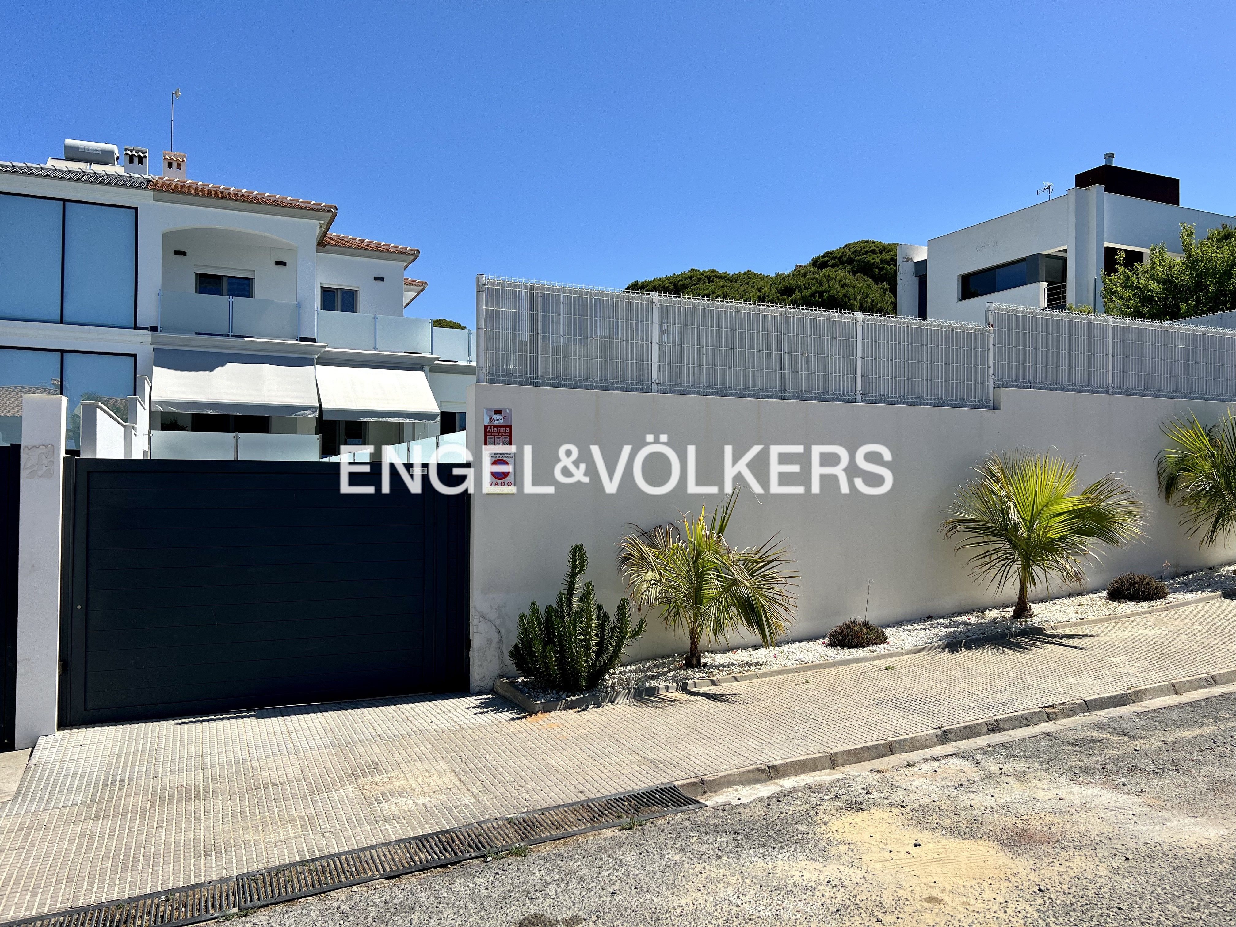 Exterior view of Single-family semi-detached for sale in Mazagón  with Air Conditioner, Heating and Private garden