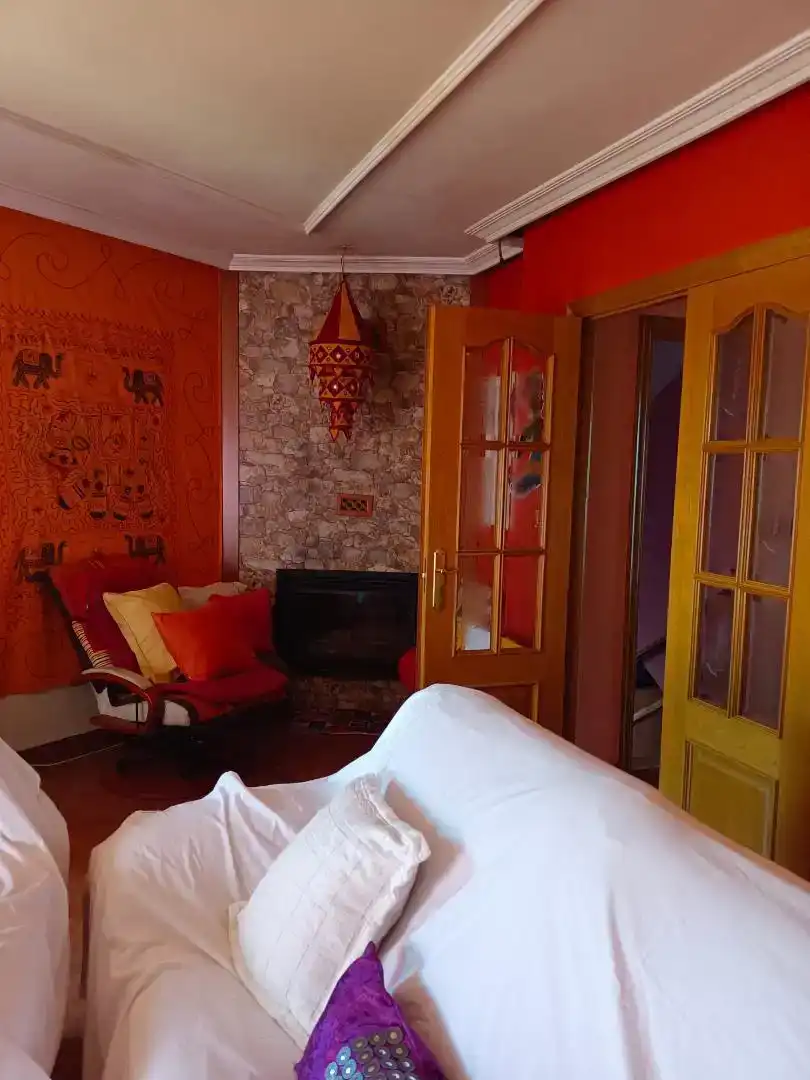 Sala d'estar de Casa o xalet en venda en Ponferrada amb Jardí privat, Parquet i Moblat