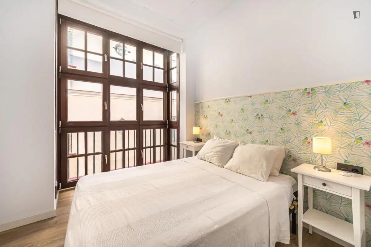 Dormitori de Apartament de lloguer en Málaga amb Aire condicionat, Moblat i Forn