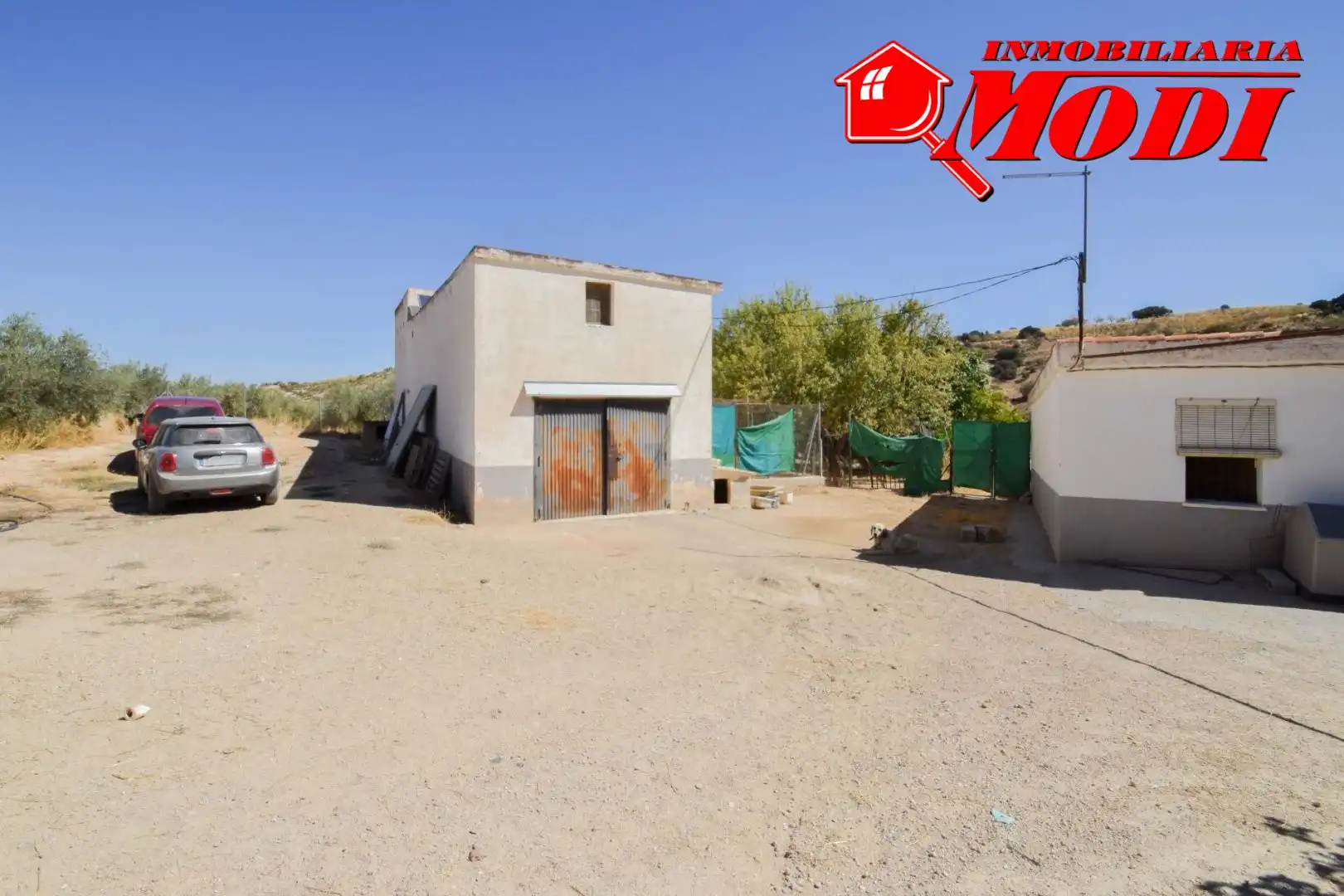 Vista exterior de Finca rústica en venda en Cacín amb Jardí privat