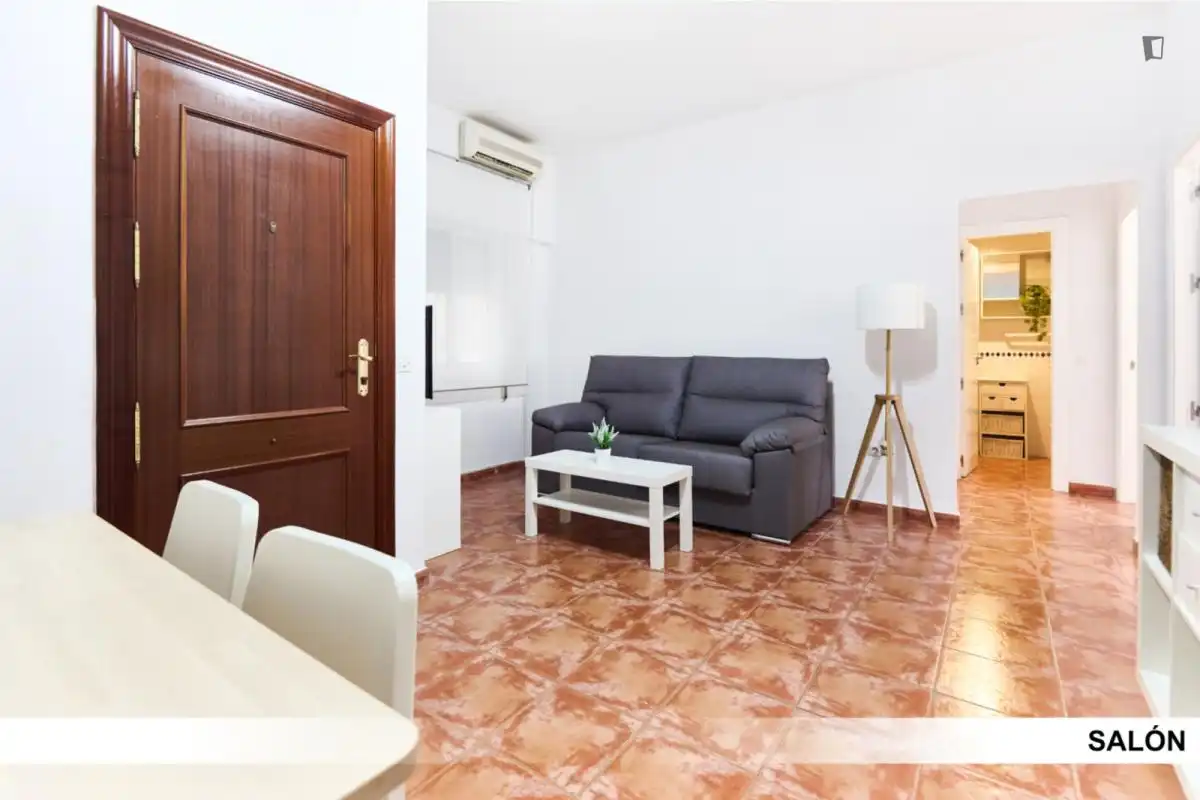 Sala d'estar de Apartament per a compartir en Alcalá de Guadaira amb Aire condicionat, Calefacció i Moblat