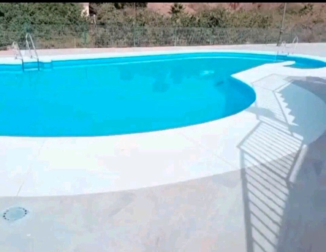 Piscina de Casa adosada de lloguer en Nerja amb Aire condicionat, Calefacció i Terrassa