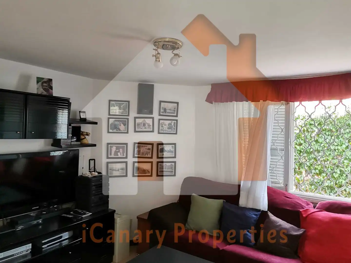 Sala de estar de Casa adosada de alquiler en San Bartolomé de Tirajana con Aire acondicionado, Jardín privado y Terraza