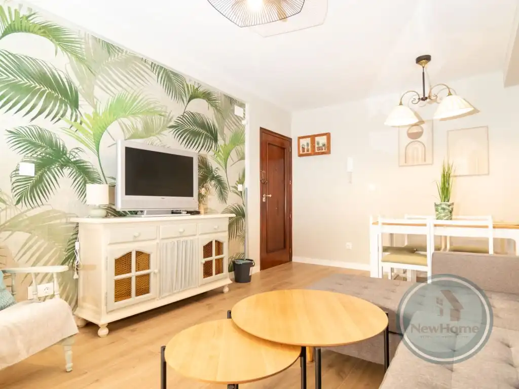 Sala d'estar de Pis de lloguer en Santa Pola amb Aire condicionat, Jardí privat i Moblat