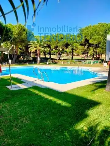 Piscina de Casa adosada en venta en Islantilla con Piscina comunitaria