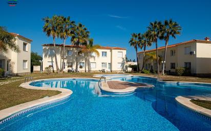 Swimming pool of Apartment for sale in Oliva  with Air Conditioner, Heating and Private garden