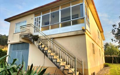 Vista exterior de Casa o xalet en venda en Abegondo amb Calefacció, Jardí privat i Parquet