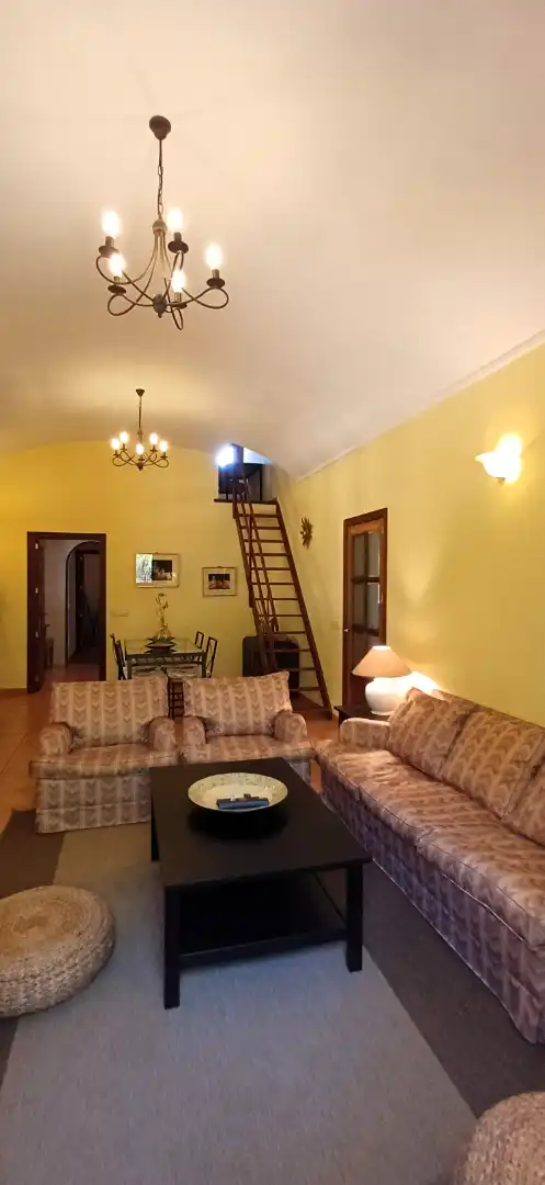 Sala de estar de Finca rústica de alquiler en Costitx con Aire acondicionado, Calefacción y Jardín privado