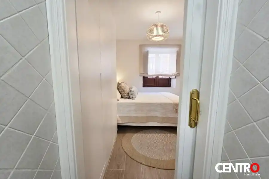Dormitori de Apartament de lloguer en Granada amb Aire condicionat