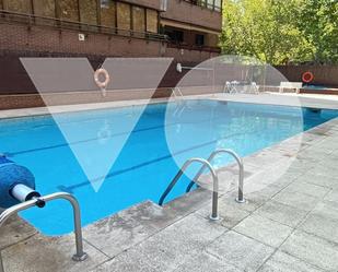 Swimming pool of Flat for sale in  Madrid Capital  with Heating, Terrace and Swimming Pool