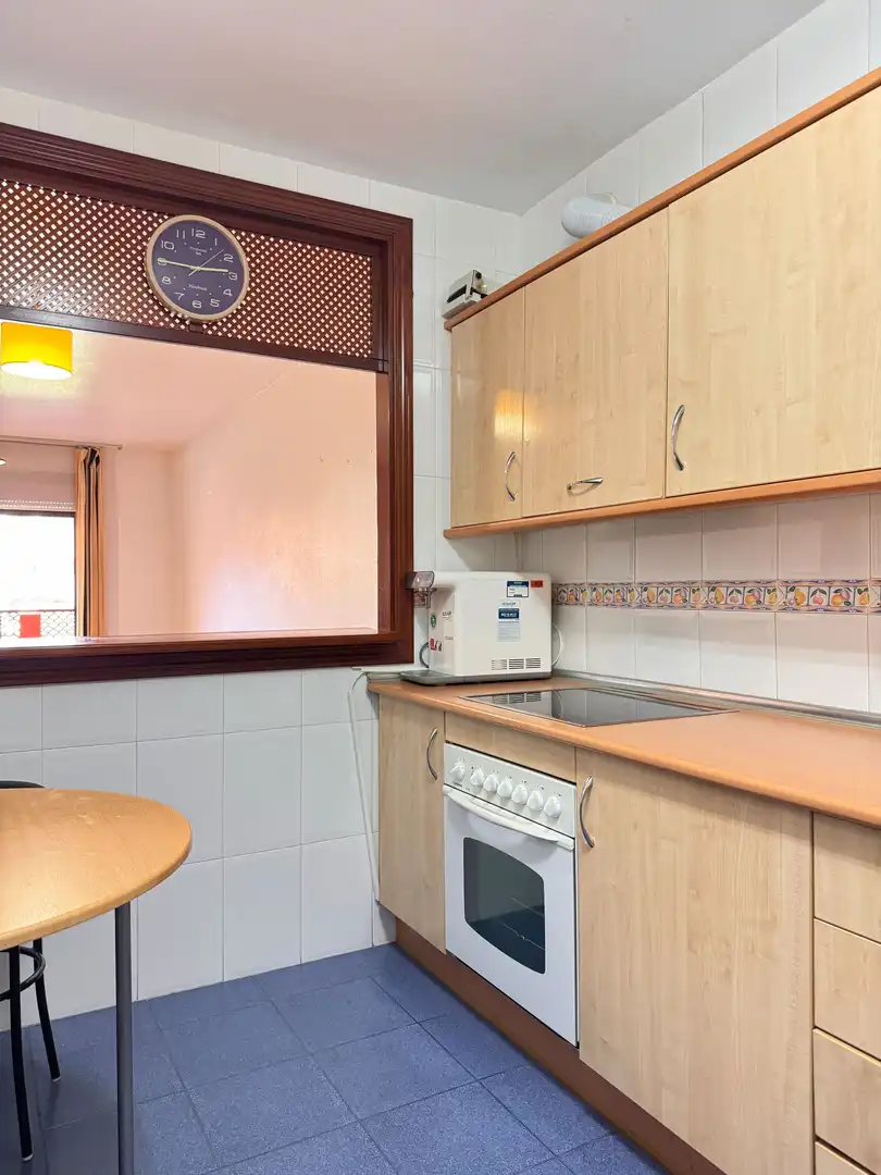 Cuina de Apartament en venda en Roquetas de Mar amb Aire condicionat, Terrassa i Piscina comunitària