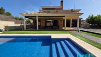 Swimming pool of House or chalet for sale in Calafell  with Air Conditioner, Heating and Private garden