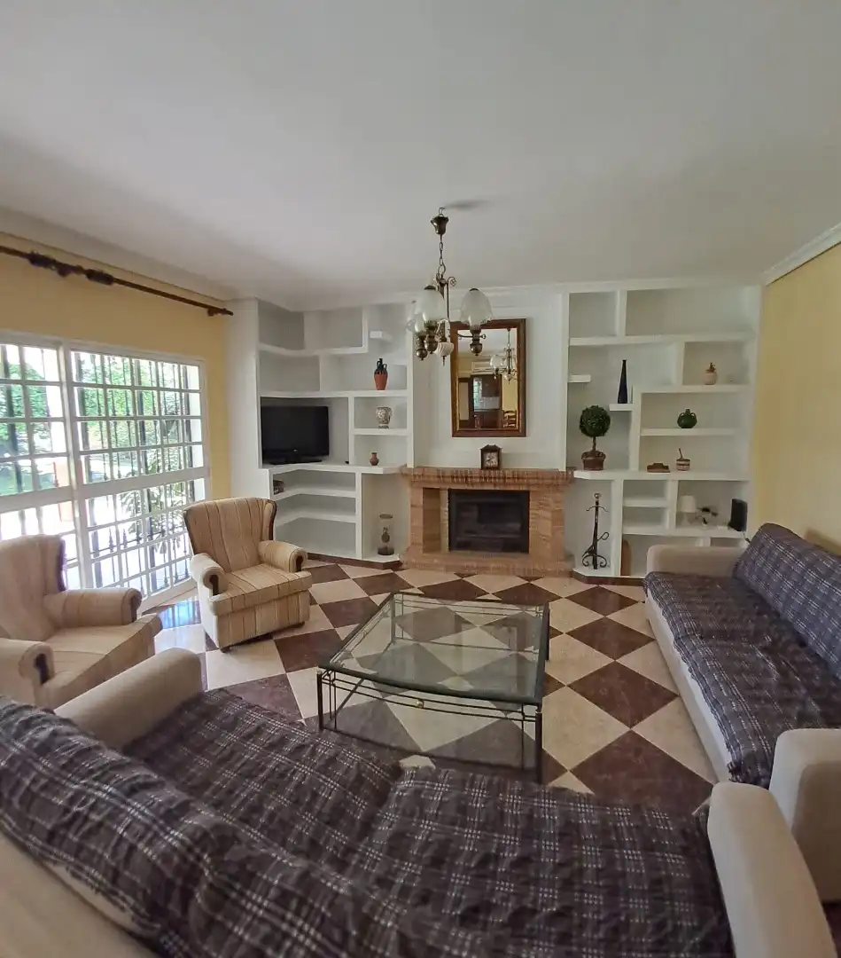 Sala de estar de Casa o chalet en venta en Palomares del Río con Aire acondicionado, Jardín privado y Terraza