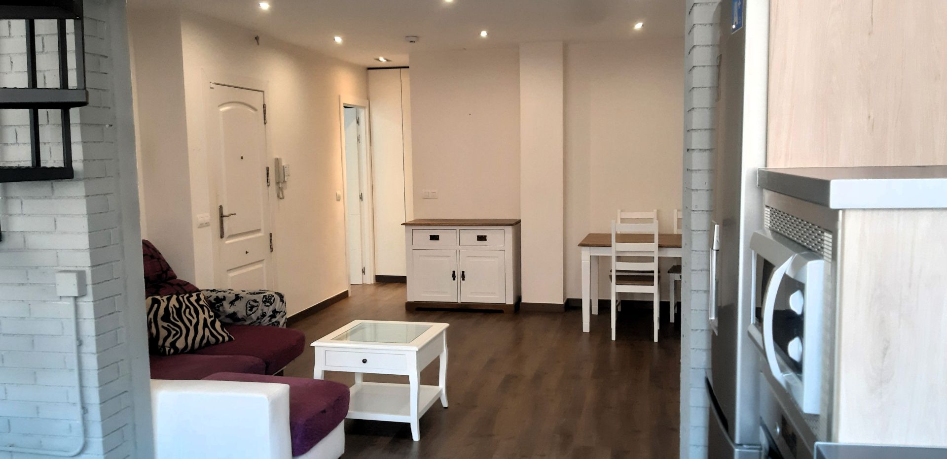 Sala d'estar de Pis de lloguer en  Almería Capital amb Aire condicionat, Moblat i Forn