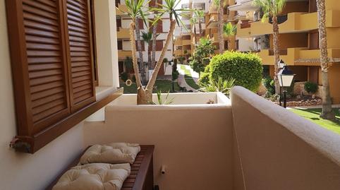 Foto 2 de Piso de alquiler en Punta Prima, Alicante