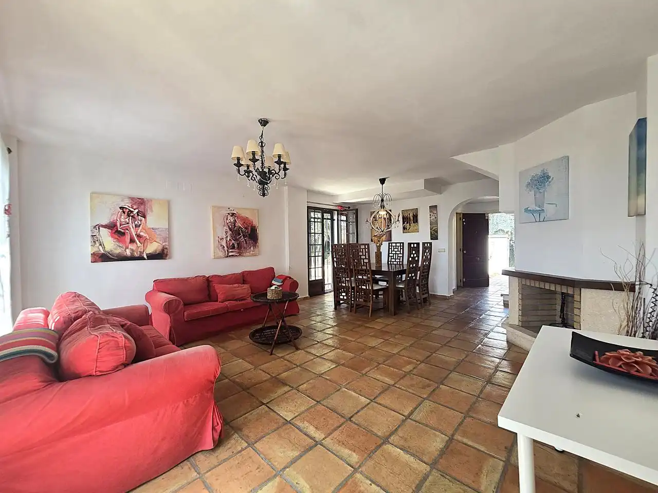 Sala d'estar de Casa adosada en venda en Finestrat amb Aire condicionat, Jardí privat i Terrassa