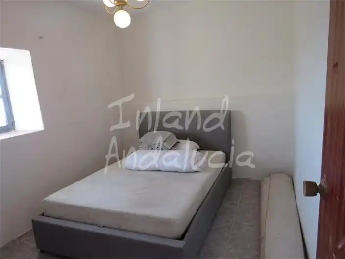 Habitación de Casa adosada en venta en Martos con Terraza y Trastero