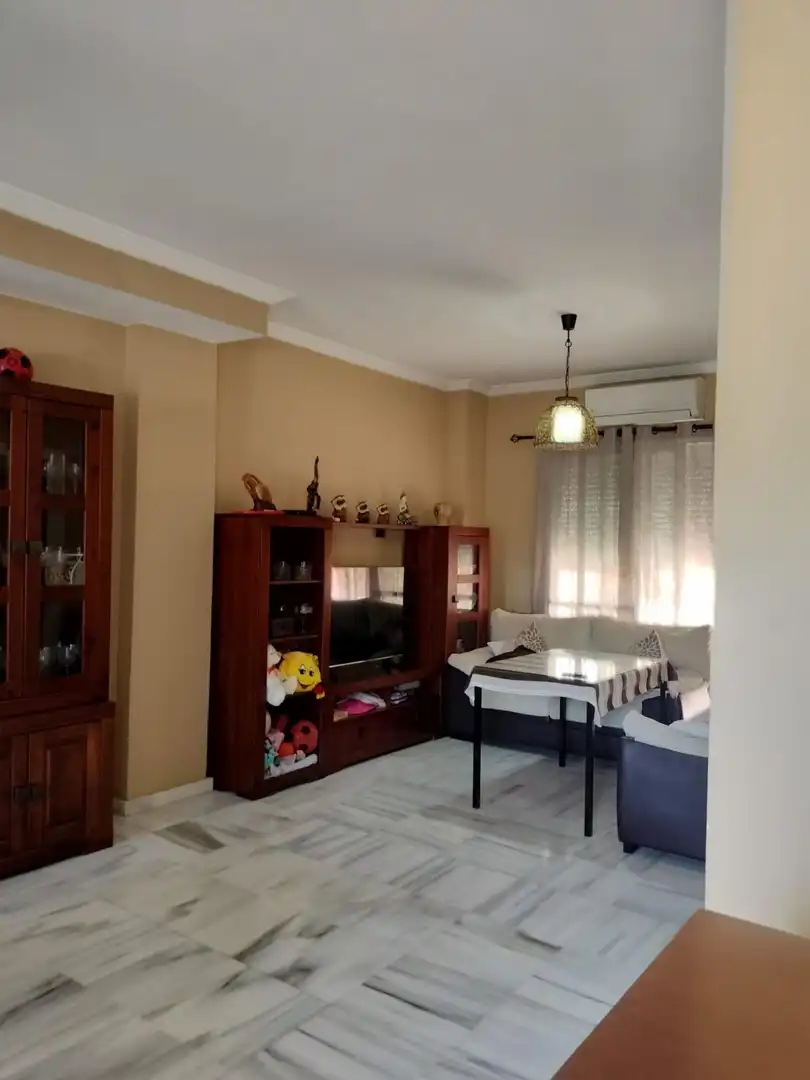 Sala de estar de Casa o chalet en venta en Coria del Río con Aire acondicionado, Terraza y Piscina comunitaria