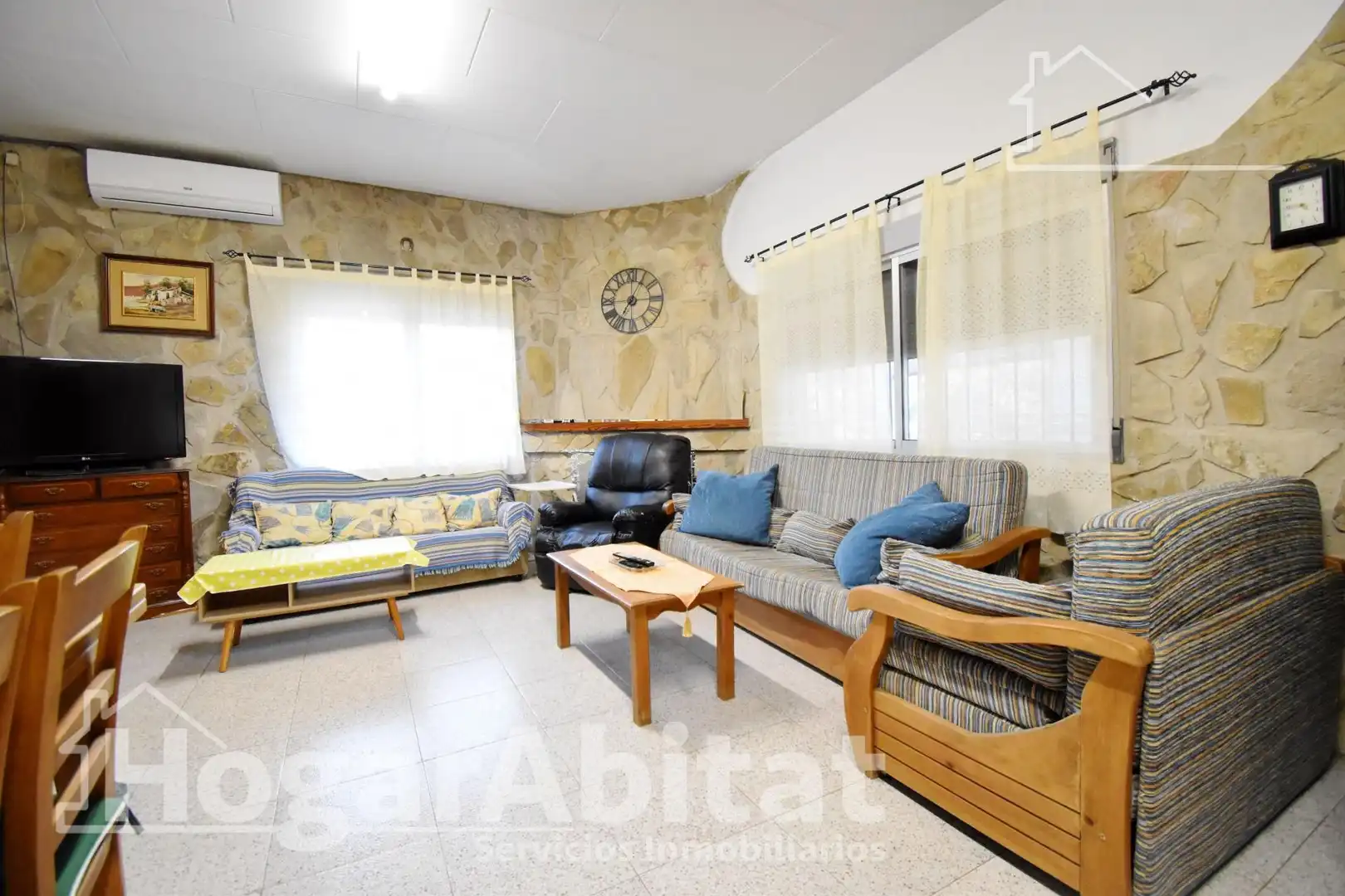 Sala de estar de Casa o chalet en venta en Simat de la Valldigna con Aire acondicionado, Calefacción y Jardín privado