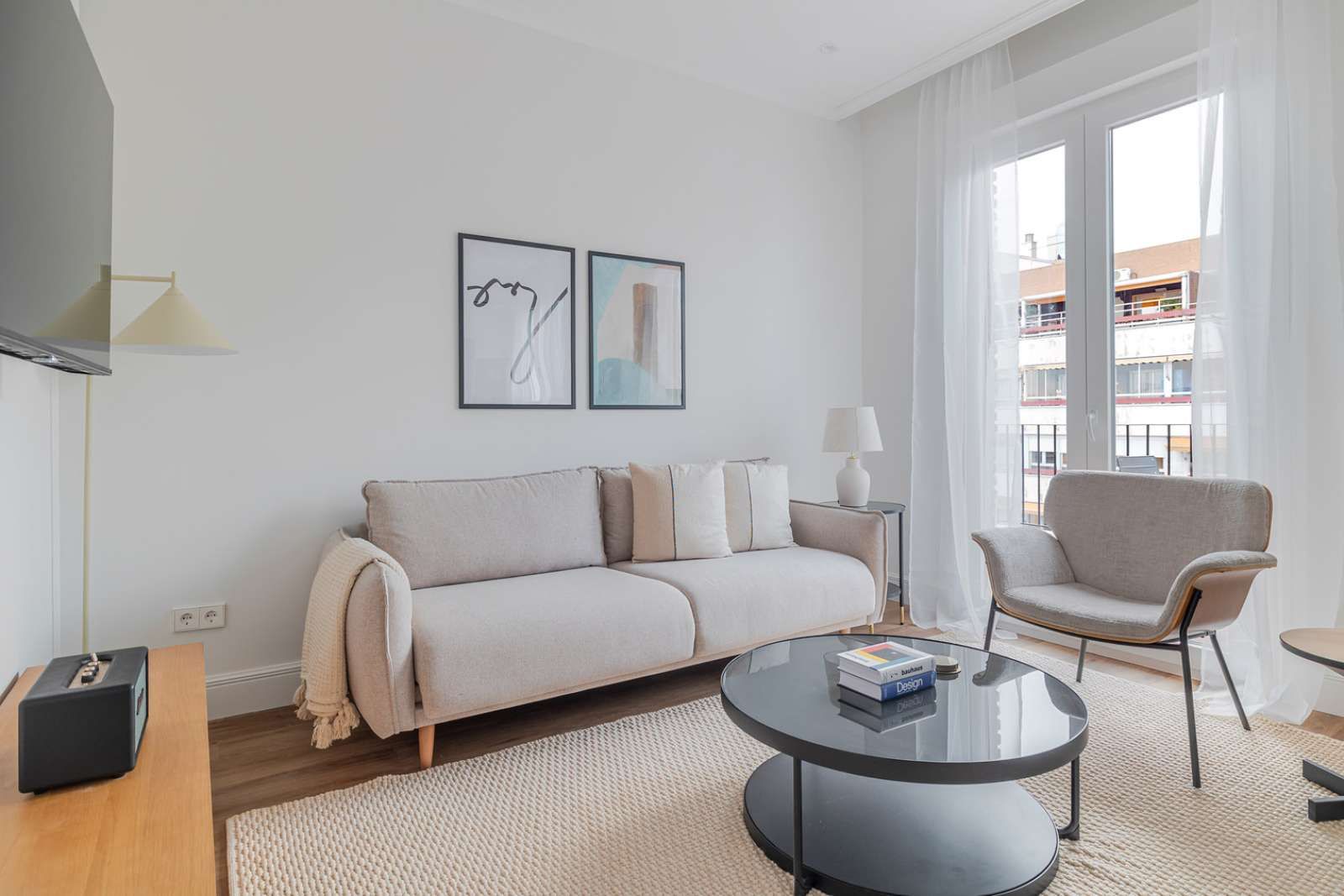 Sala d'estar de Apartament per a compartir en  Madrid Capital amb Aire condicionat, Terrassa i Moblat