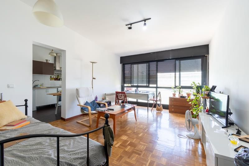 Living room of Flat for sale in  Madrid Capital  with Heating, Parquet flooring and Storage room