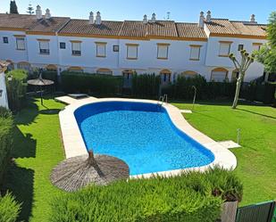 Piscina de Casa adosada de lloguer en El Puerto de Santa María amb Aire condicionat, Calefacció i Terrassa