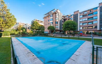 Swimming pool of Flat for sale in  Madrid Capital  with Air Conditioner