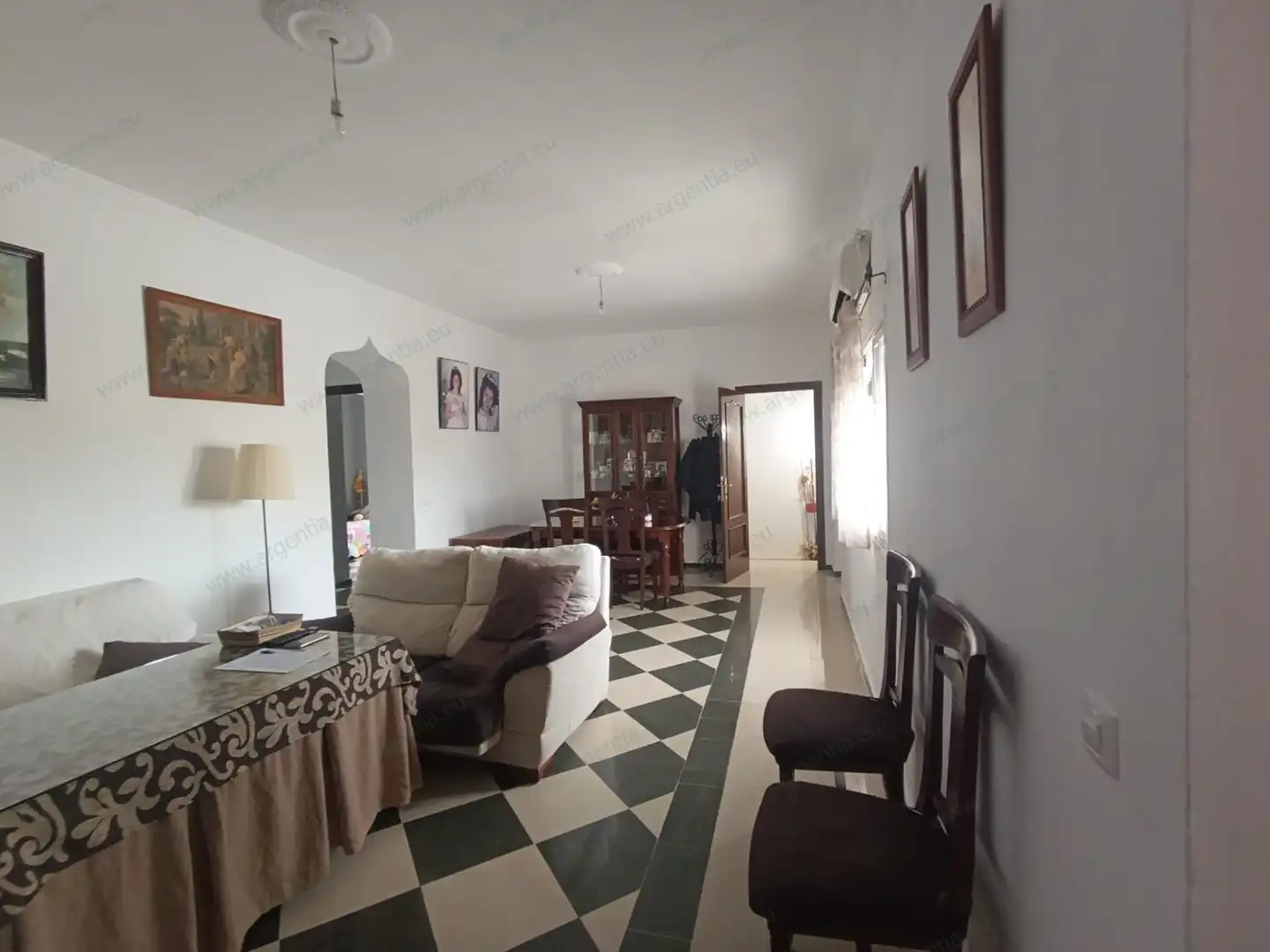Sala de estar de Piso en venta en Almadén de la Plata con Aire acondicionado, Terraza y Amueblado