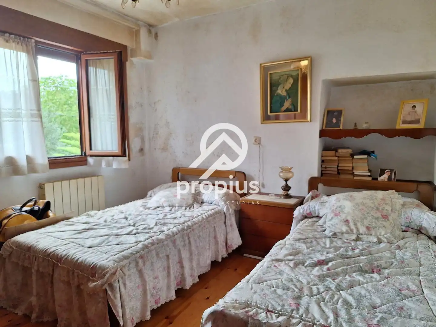 Dormitori de Casa adosada en venda en Llanes amb Calefacció