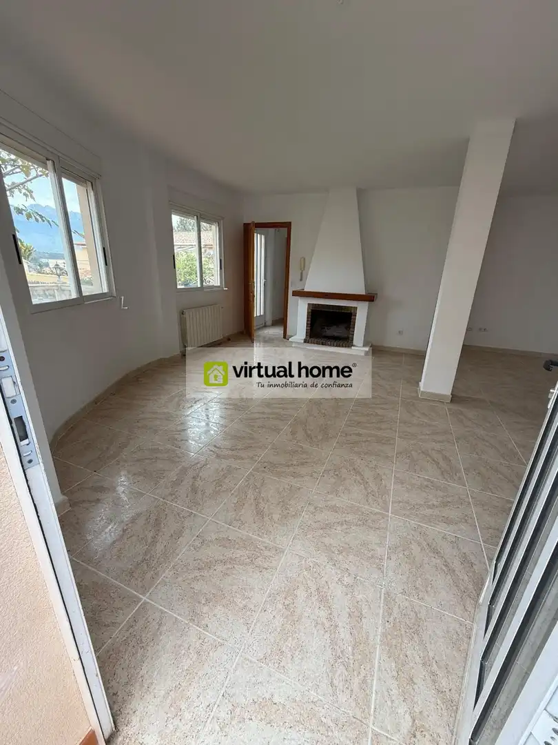 Sala de estar de Casa o chalet en venta en La Nucia con Jardín privado, Terraza y Trastero
