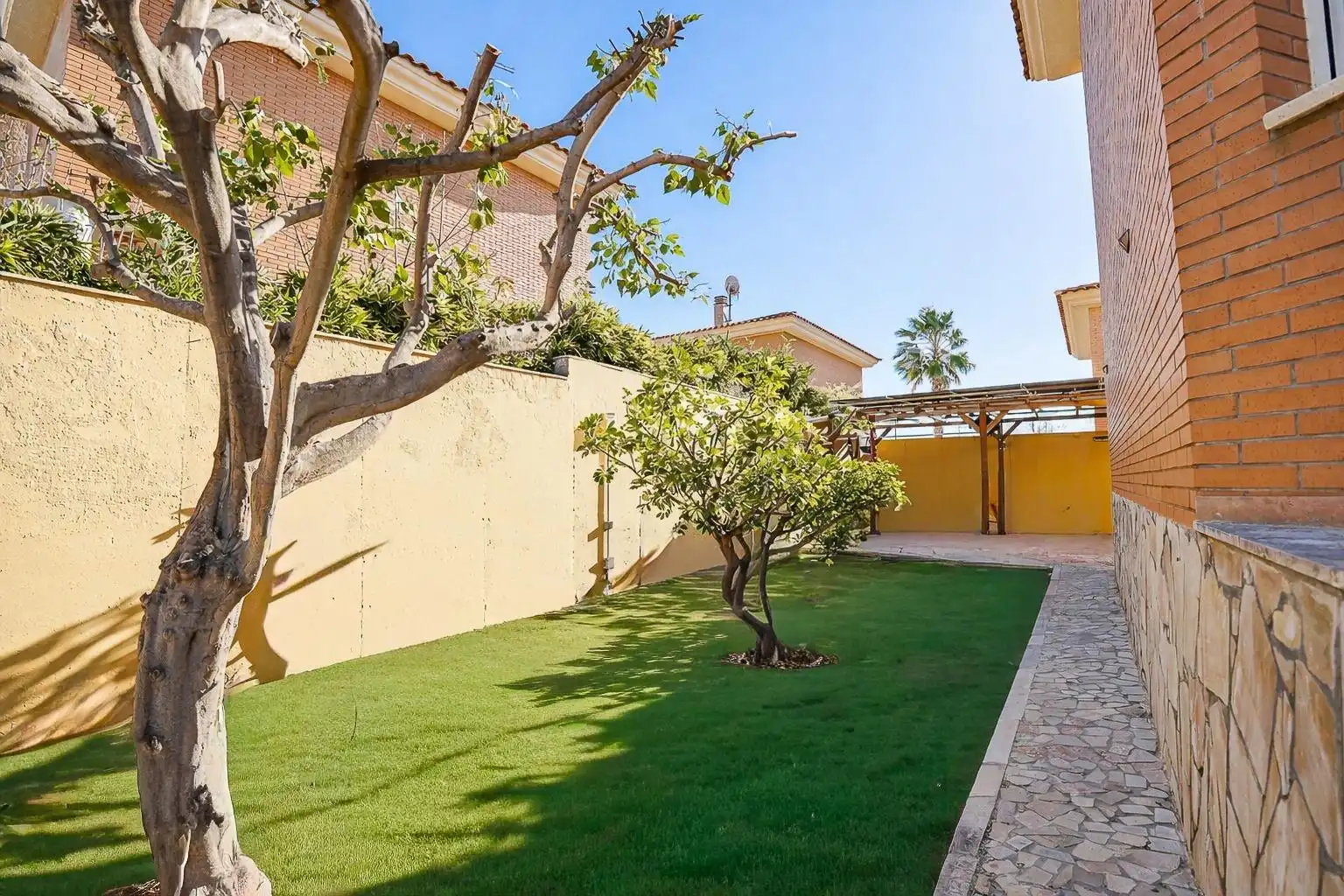 Garten von Einfamilien-Reihenhaus zum Verkauf in Cambrils mit Klimaanlage, Heizung und Privatgarten