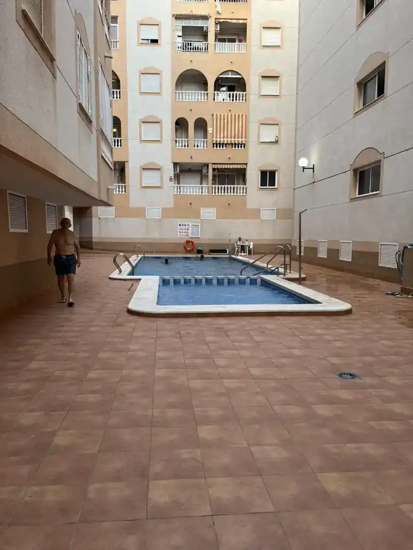 Piscina de Ático de alquiler en Torrevieja con Aire acondicionado, Amueblado y Horno