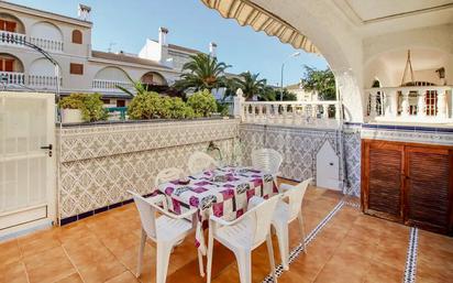 Jardí de Casa adosada en venda en Santa Pola amb Aire condicionat, Terrassa i Moblat