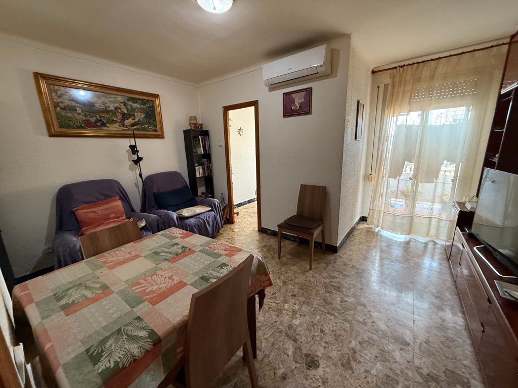 Living room of Flat for sale in Badalona  with Air Conditioner, Furnished and Balcony
