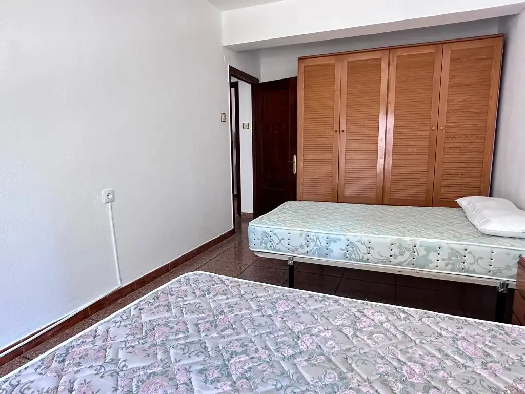 Bedroom of Flat for sale in Gijón   with Heating, Terrace and Furnished