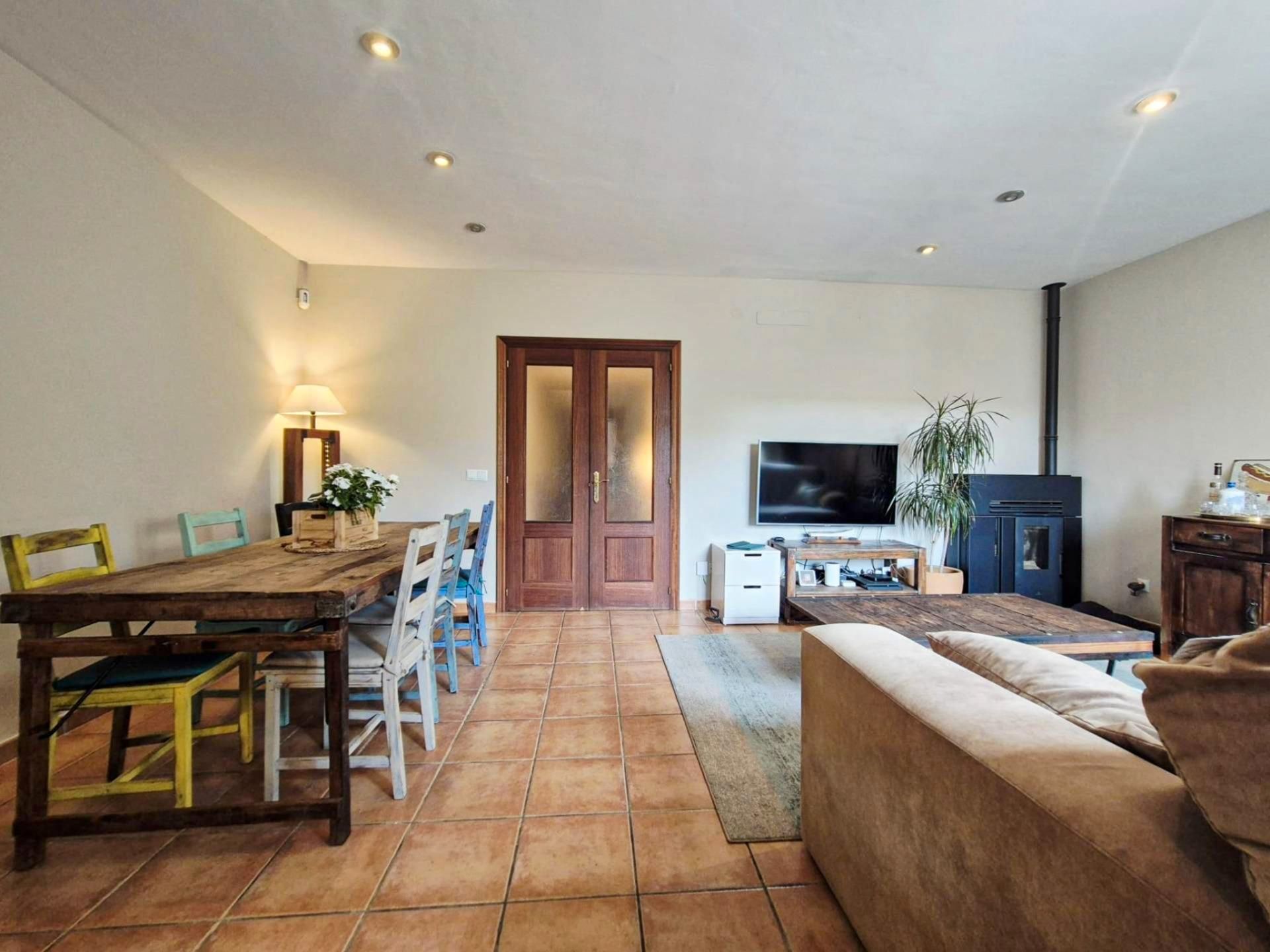 Sala d'estar de Casa adosada en venda en Lloseta amb Aire condicionat, Jardí privat i Terrassa