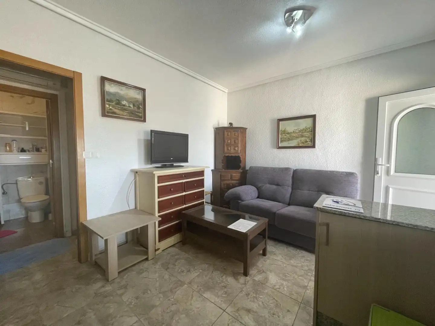 Sala d'estar de Casa adosada en venda en Rojales