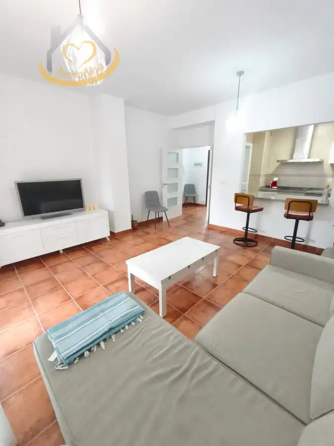 Sala de estar de Apartamento en venta en El Rompido con Aire acondicionado, Terraza y Amueblado
