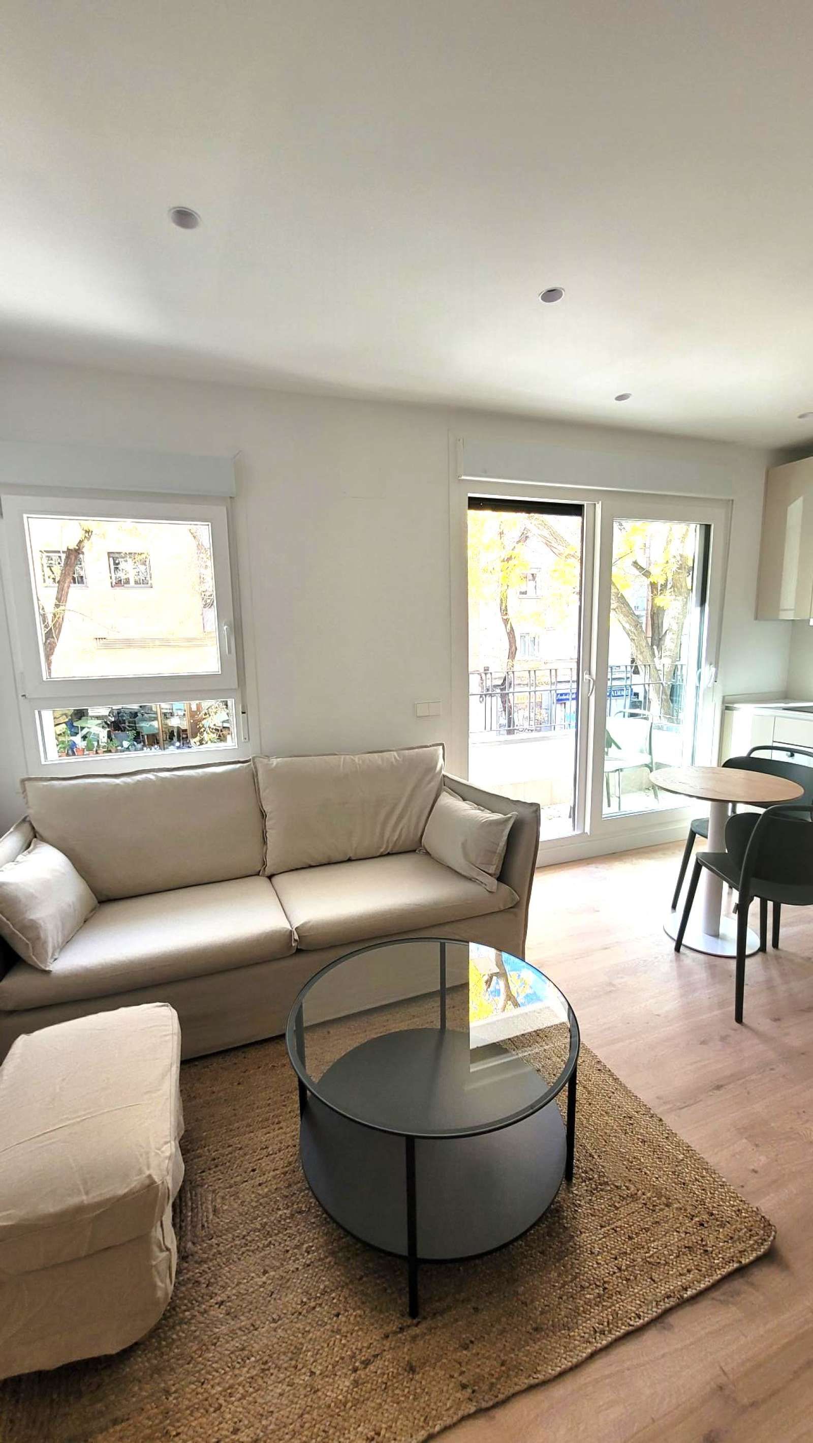 Living room of Study to share in  Madrid Capital  with Air Conditioner, Heating and Terrace